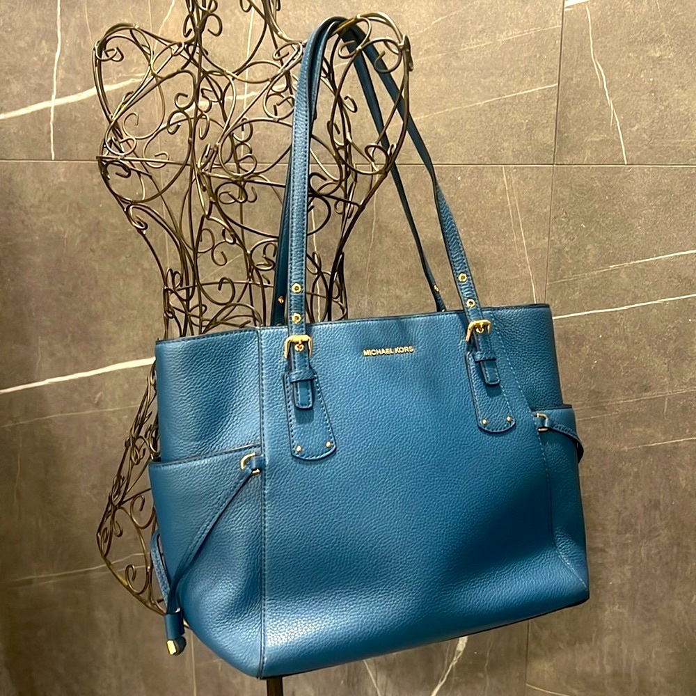 Michael Kors NWT shoulder bag.  Calm blue color with gold hardware